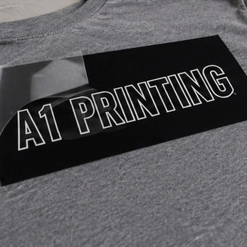 Heat press applying DTF transfer to black t-shirt