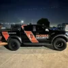 Custom ute signage Melbourne with company logo and contact details on a branded utility vehicle